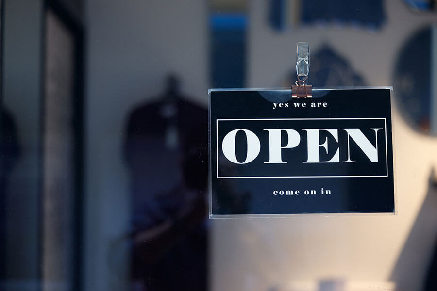 photo of an open sign in a business storefront