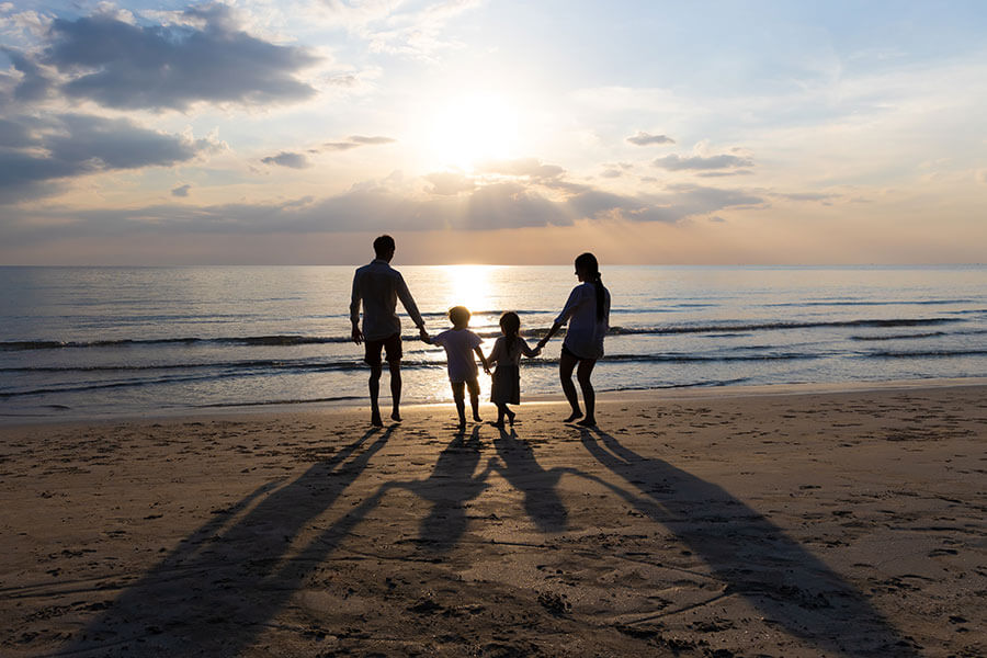 photo of a family on a beach